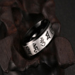 Bague homme noire en acier � bandeau bouddhisme