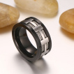 Bague homme noire en acier � pourtour de filins et grille