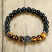 Bracelet homme en perles noires et Oeil de Tigre � croix