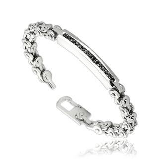 Bracelet homme en acier style chaine de v�lo avec barre sertie de pierres noires