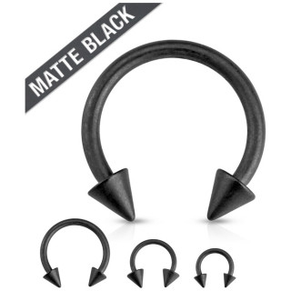 Piercing fer � cheval en acier noir mat � pointes