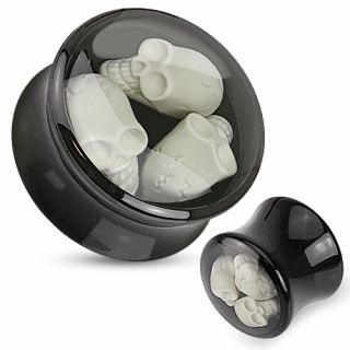 Piercing �carteur noir type plug renfermant 3 petits cranes humains